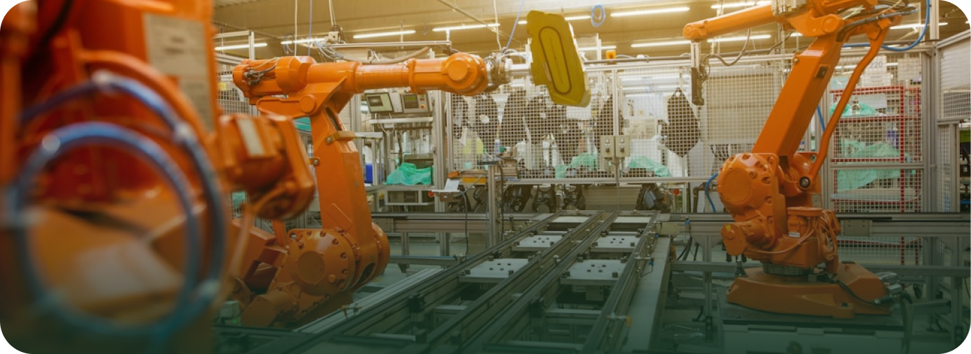 Industrial robotic arms on a manufacturing line